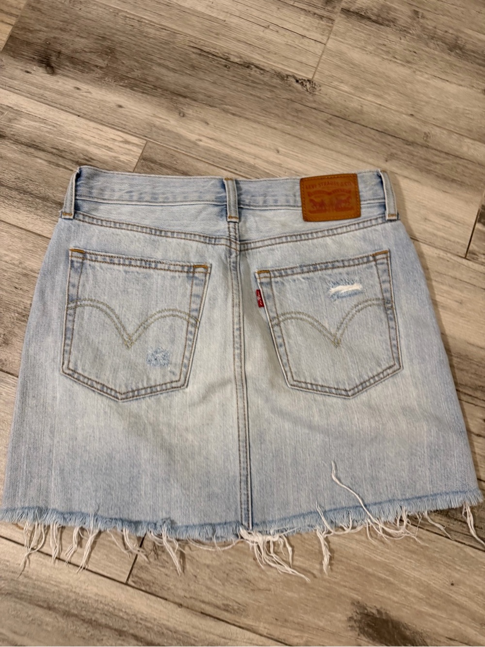 Levi's Light Wash Distressed Denim Mini Skirt with Frayed Hem - Picture 2 of 3